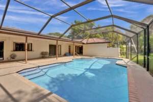 Covered Pool and expansive patio!