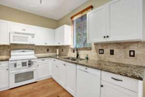 White Kitchen with granite counters!